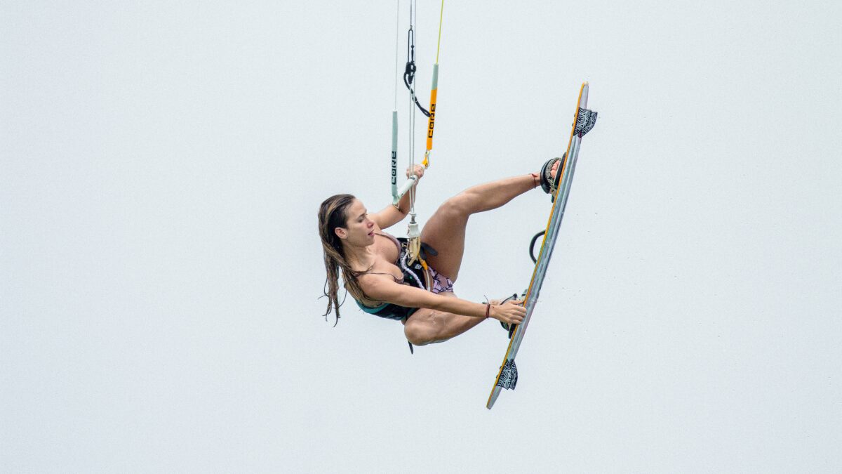 A Woman Kitesurfing on the Sea